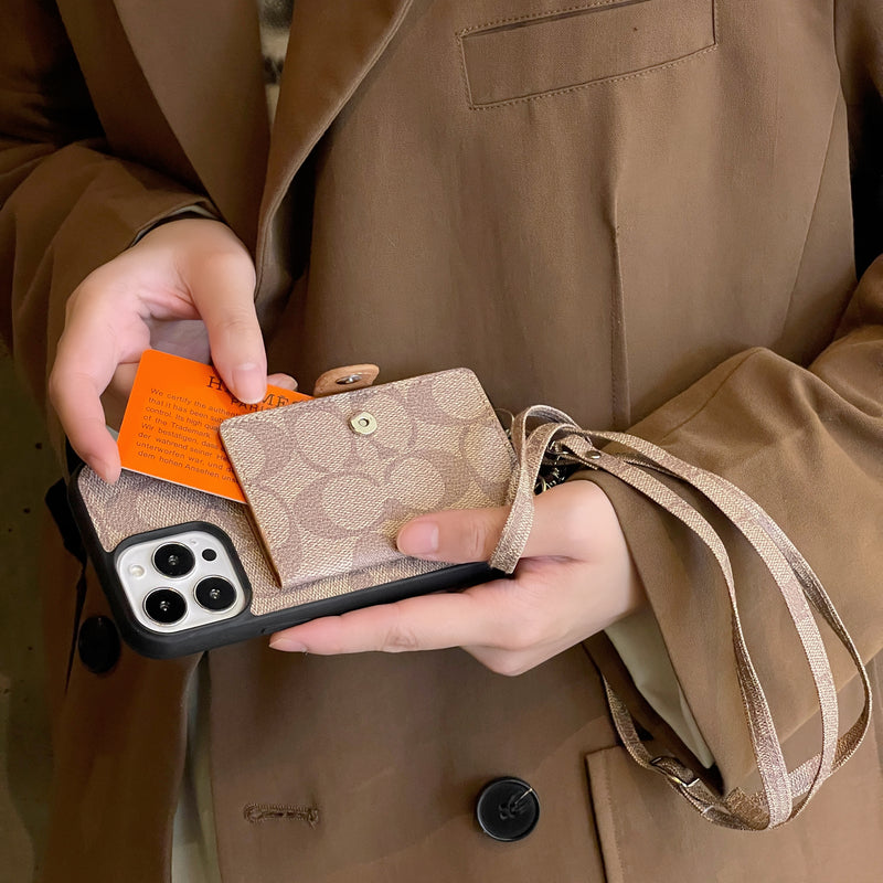 Pouzdro na iPhone Coach s peněženkou a popruhem bílé -SZK240402