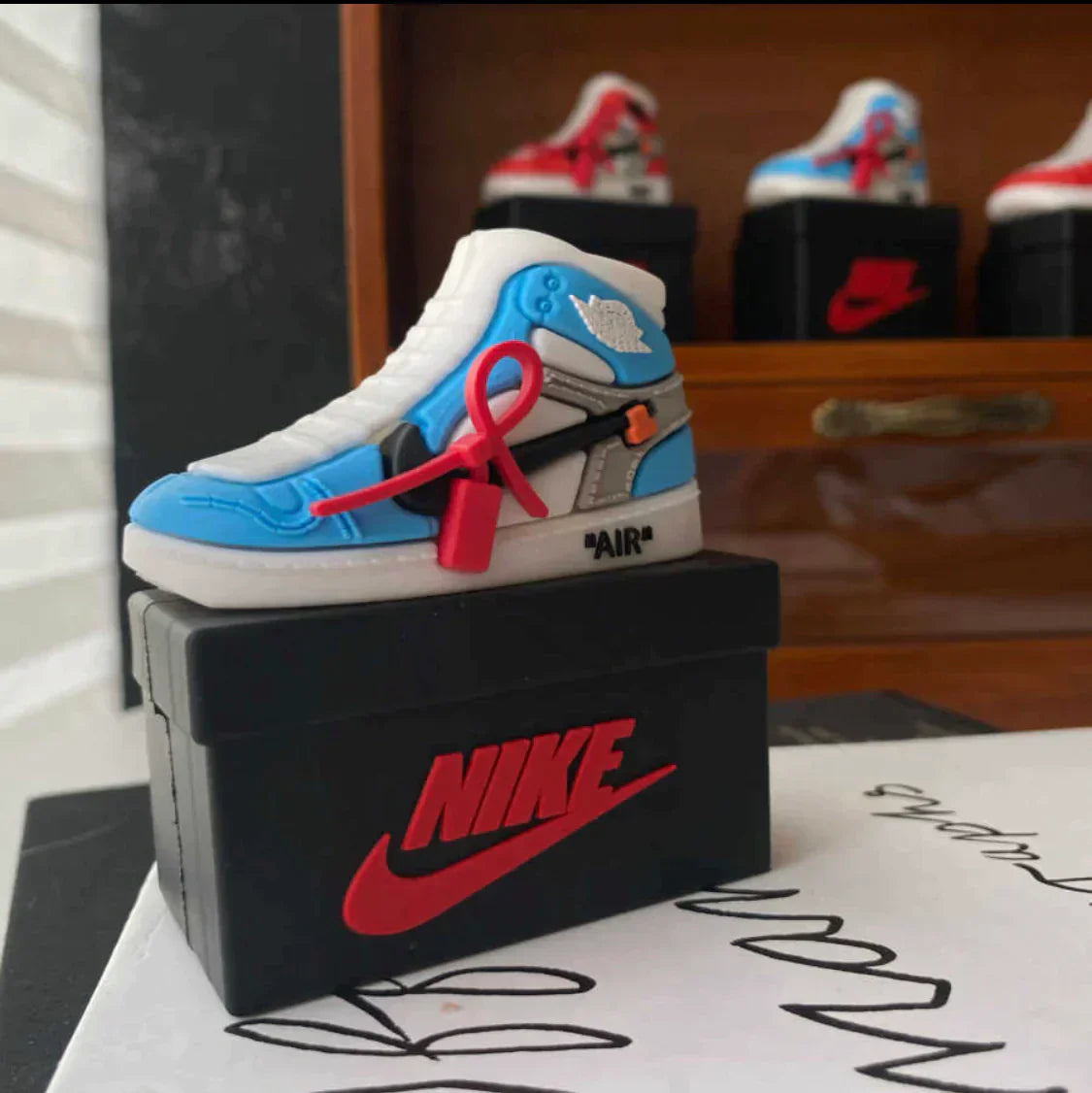 Pouzdra na sluchátka Nike AirPods