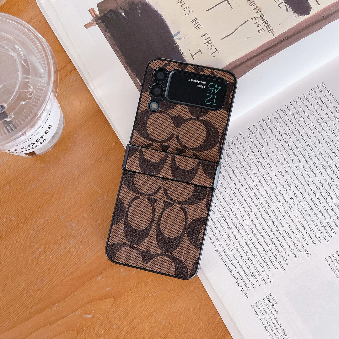 Capa de telefone Samsung Coach Z Flip/Z Fold com alça de dedo
