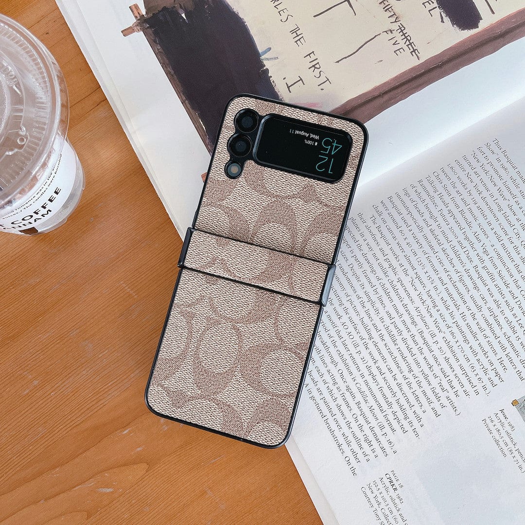 Capa de telefone Samsung Coach Z Flip/Z Fold com alça de dedo